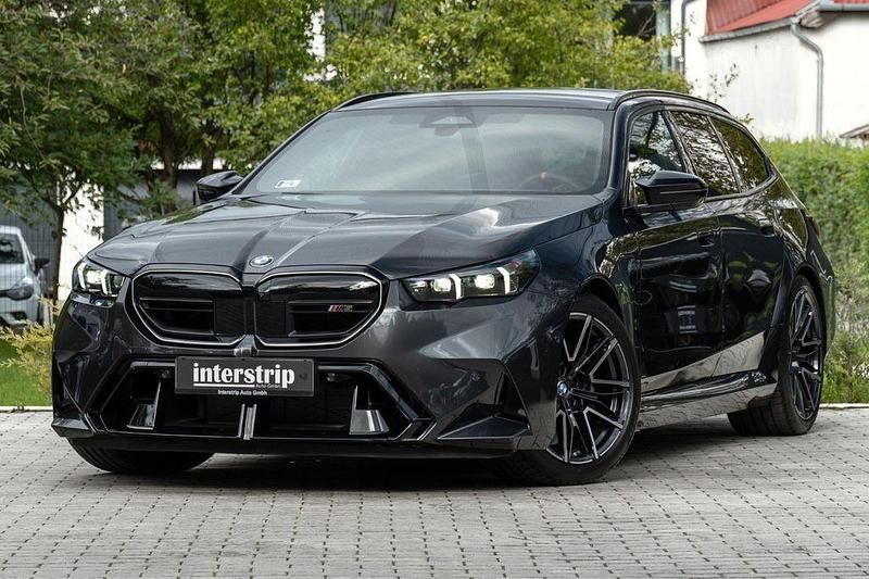 Grau Gebraucht 2025 BMW M5 Performance Kombi | 123.990 € (Superpreis) - Bild 1/4