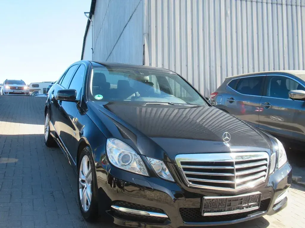 Second-hand Mercedes E250 204 CP (150 kW) 2011 Negru Berlinǎ