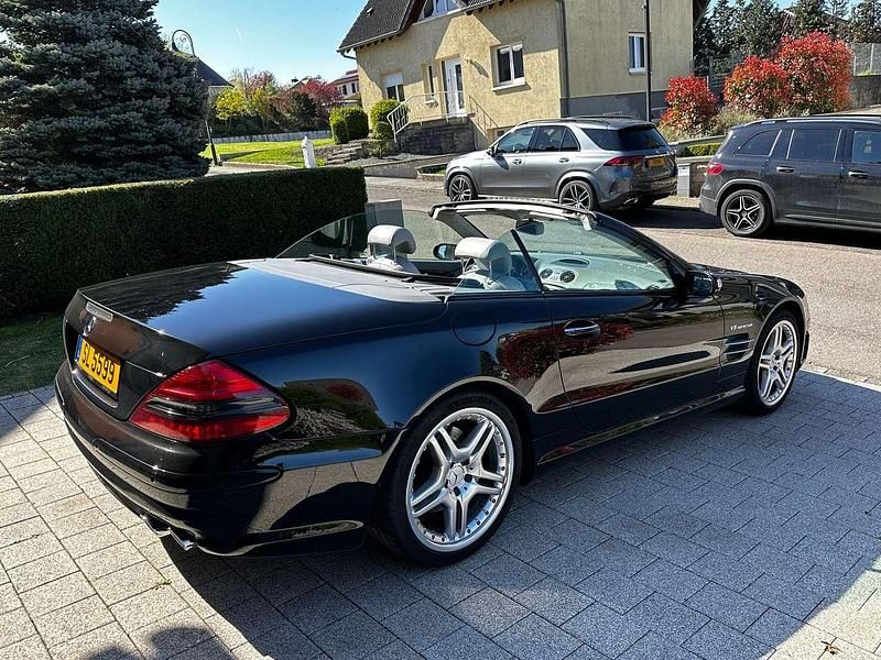 Schwarz Gebraucht 2006 Mercedes SL55 AMG AMG Cabrio | 54.900 € (Teuer) - Bild 1/4