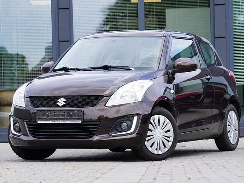 Braun Gebraucht 2015 Suzuki Swift Club Kleinwagen | 6.480 € (Fairer Preis) - Bild 1/4