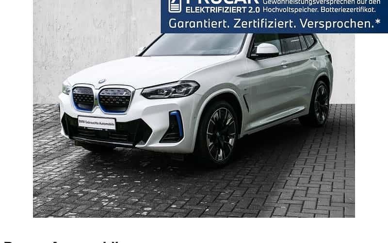 Mineralweiss Gebraucht 2024 BMW iX3 Impressive SUV | 49.890 € (Superpreis) - Bild 1/4