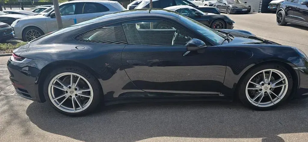 Gebraucht Porsche 911 385 PS (283 kW) 2024 Schwarz