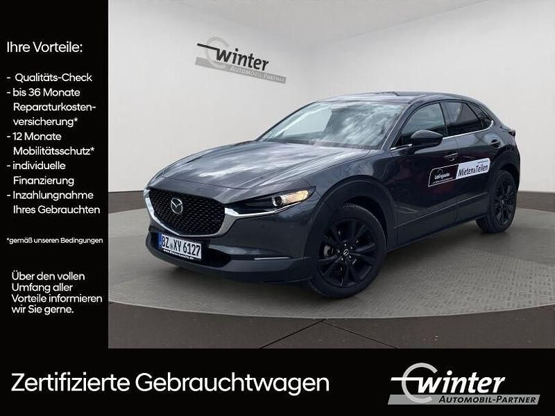 46g machine gray metallic Gebraucht 2024 Mazda CX-30 Homura-Line SUV | 28.940 € (Teuer) - Bild 1/4