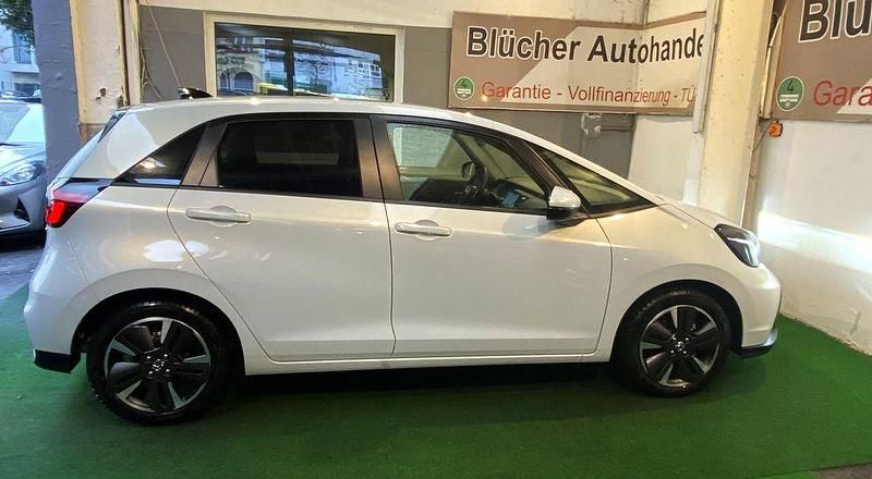 Gebraucht Honda Jazz Advance 122 PS (89 kW) 2025 Premium sunlight white Kleinwagen