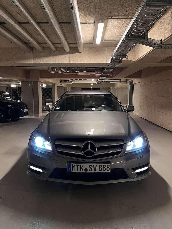 Grau Gebraucht 2013 Mercedes C220 AMG Coupé | 9.950 € (Fairer Preis) - Bild 1/4
