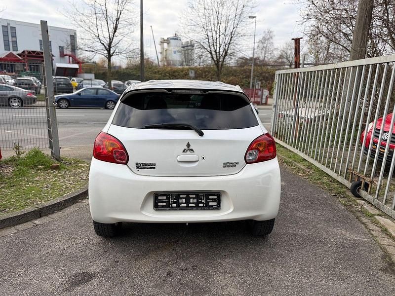 Gebraucht Mitsubishi Space Star 80 PS (58 kW) 2013 Weiß Kleinwagen
