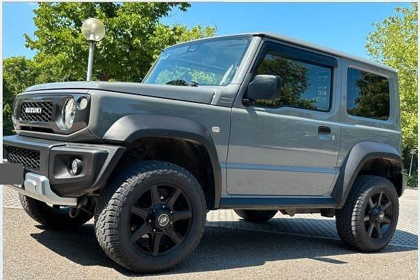 Grau Gebraucht 2021 Suzuki Jimny Comfort SUV | 30.900 € (Fairer Preis) - Bild 1/4