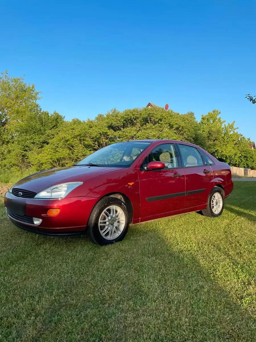 Occasion Ford Focus Ghia 101 ch (74 kW) 1999 Rouge Berline