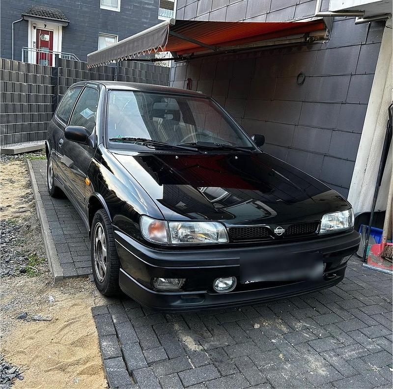 Schwarz Gebraucht 1991 Nissan Sunny Kleinwagen | 11.500 € - Bild 1/4