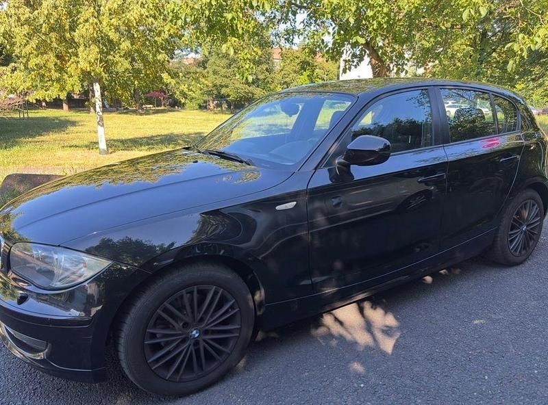 Second-hand BMW 116 122 CP (89 kW) 2010 Negru Hatchback