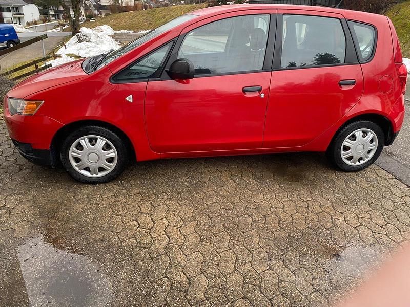 Gebraucht Mitsubishi Colt 95 PS (69 kW) 2009 Rot Kleinwagen
