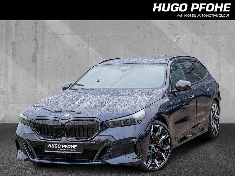 Tansanitblau ii metallic Gebraucht 2024 BMW 520 M Sport Kombi | 61.790 € (Teuer) - Bild 1/4