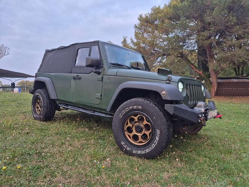 Grün Gebraucht 2024 Jeep Wrangler SUV | 39.950 € - Bild 1/4
