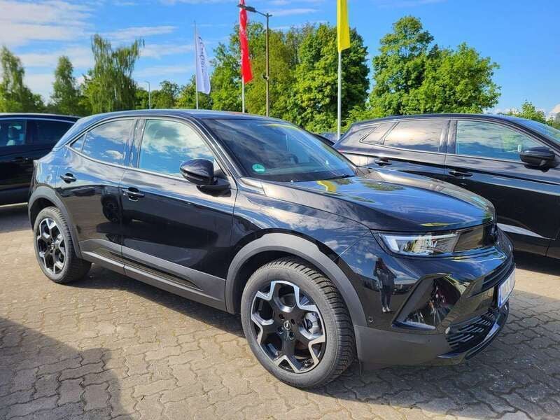 Karbon schwarz Gebraucht 2025 Opel Mokka-e Ultimate SUV | 36.640 € - Bild 1/4