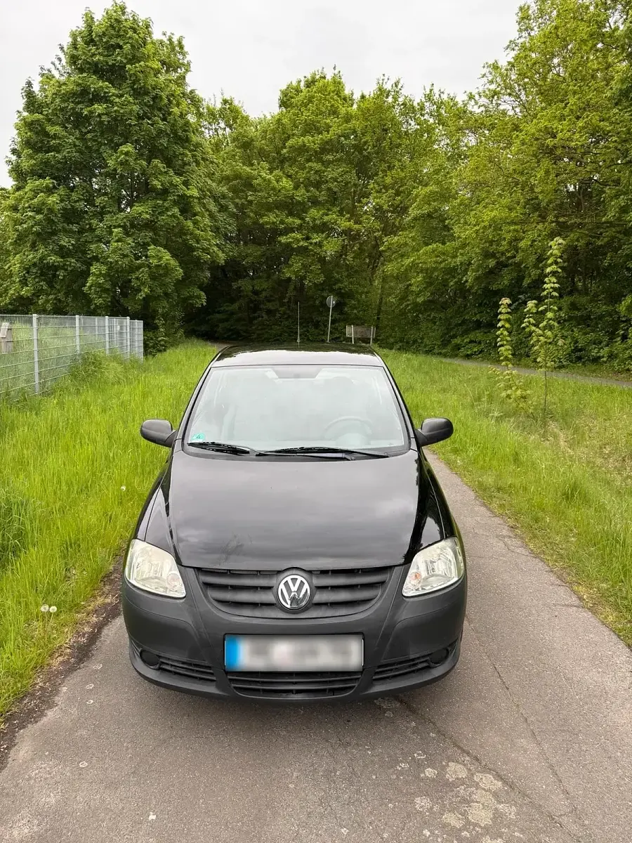 Gebraucht VW Fox 60 PS (44 kW) 2011 Schwarz Kleinwagen