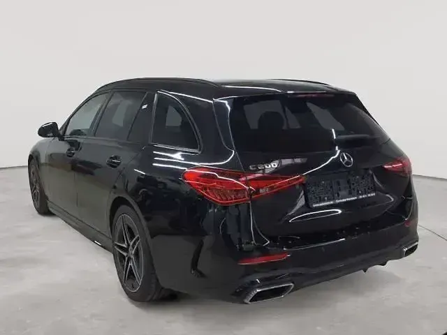 Gebraucht Mercedes C200 AMG line 204 PS (150 kW) 2022 Obsidianschwarz metallic Kombi