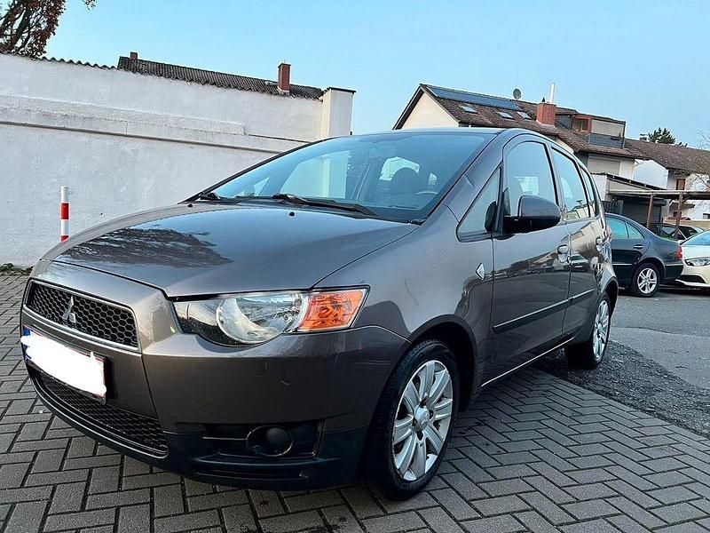 Gebraucht Mitsubishi Colt 95 PS (69 kW) 2011 Braun Van / Kleinbus