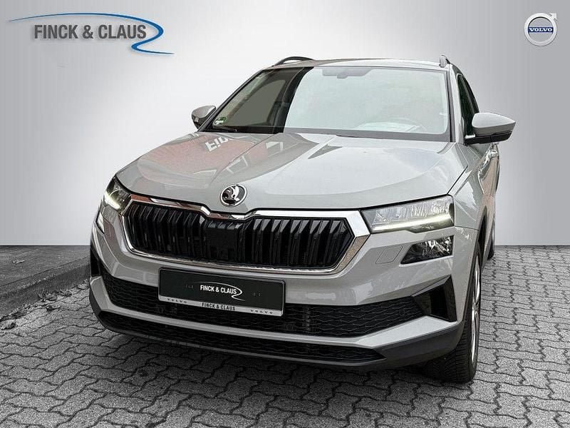 Stahlgrau Gebraucht 2023 Skoda Karoq Tour SUV | 28.890 € (Guter Preis) - Bild 1/4