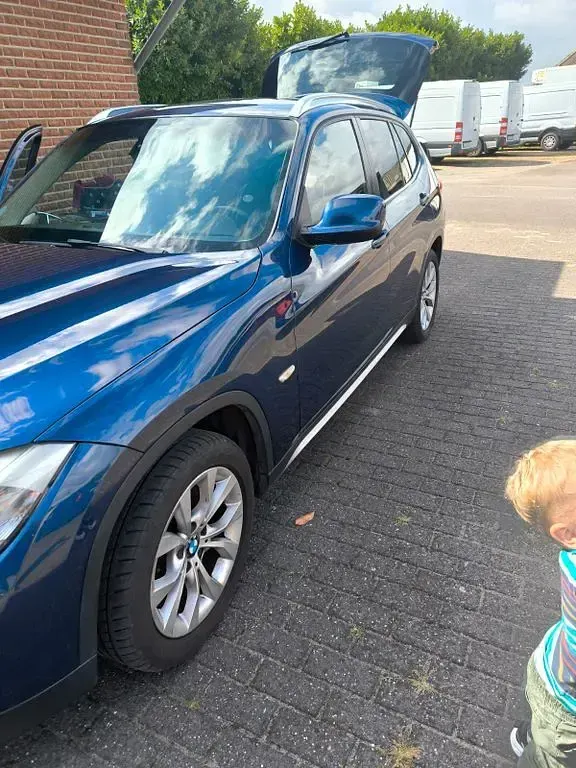 Second-hand BMW X1 204 CP (150 kW) 2011 Albastru SUV