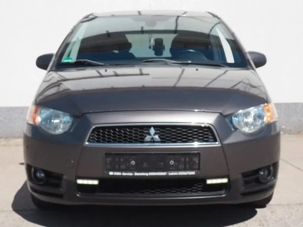 Gebraucht Mitsubishi Colt Motion 95 PS (69 kW) 2011 Braun Kleinwagen