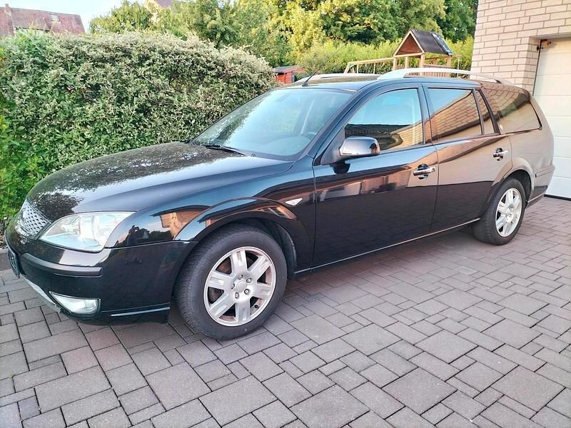 Schwarz Gebraucht 2007 Ford Mondeo Ghia Kombi | 2.650 € - Bild 1/4
