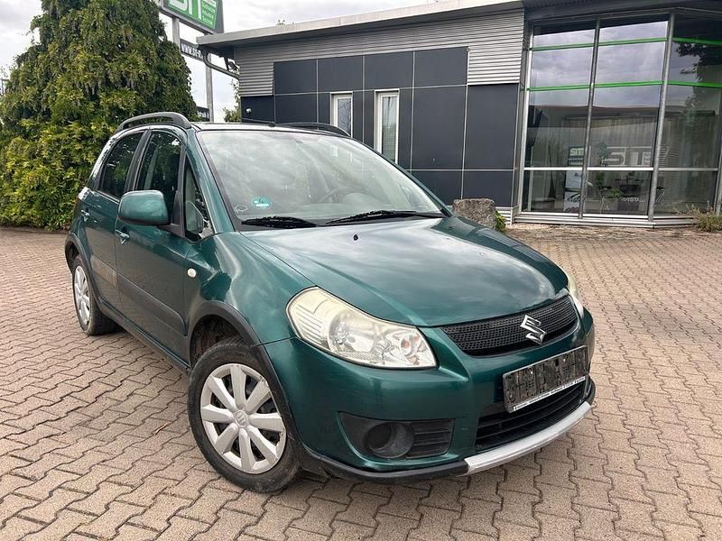 Grün Gebraucht 2006 Suzuki SX4 Comfort SUV | 1.990 € (Superpreis) - Bild 1/4