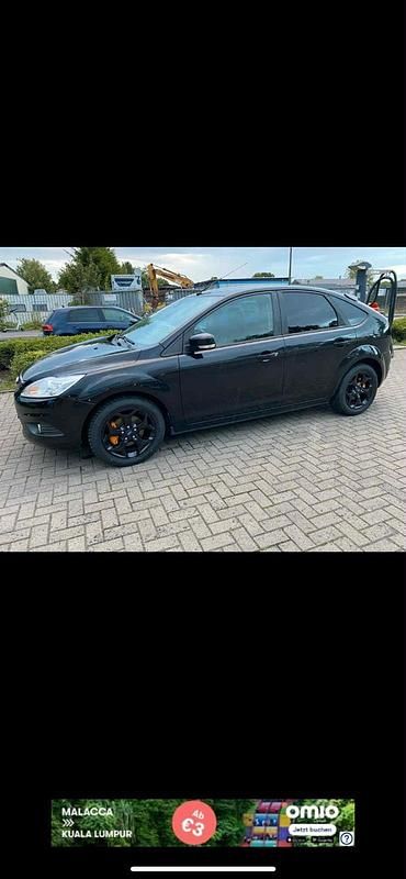 Gebraucht Ford Focus 105 PS (77 kW) 2010 Schwarz Limousine