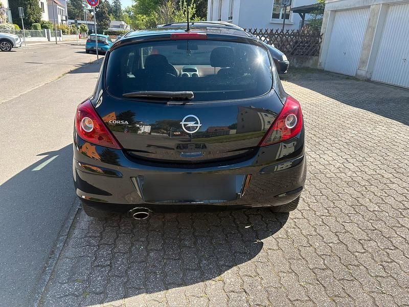 Second-hand Opel Corsa 100 CP (73 kW) 2011 Negru Hatchback