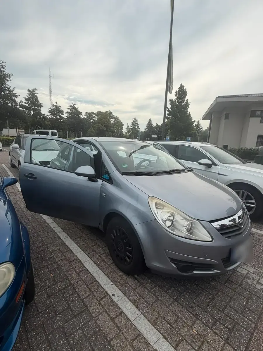 Gebraucht Opel Corsa 60 PS (44 kW) 2009 Grau Kleinwagen