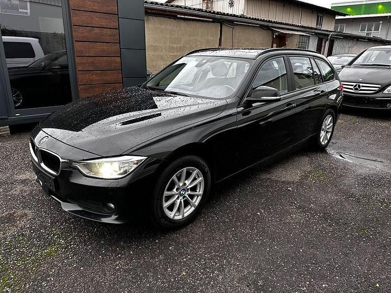 Schwarz Gebraucht 2014 BMW 320 Comfort Edition Kombi | 6.900 € (Teuer) - Bild 1/4