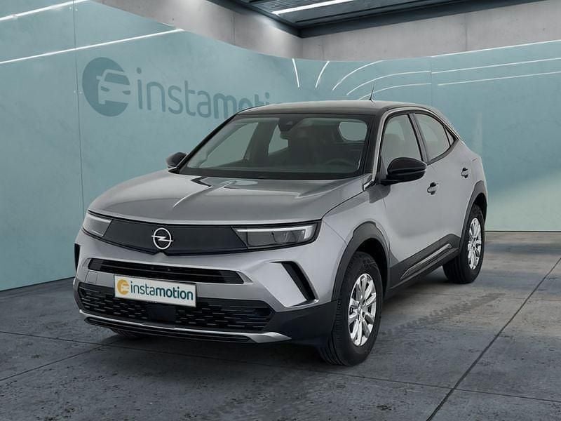 Grau Gebraucht 2024 Opel Mokka Enjoy SUV | 20.199 € (Superpreis) - Bild 1/4