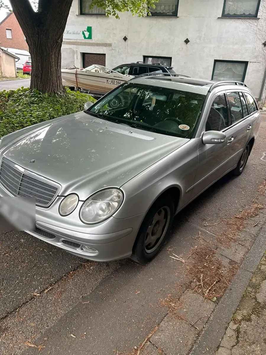 Używany Mercedes E220 150 KM (110 kW) 2004 Srebrny Kombi
