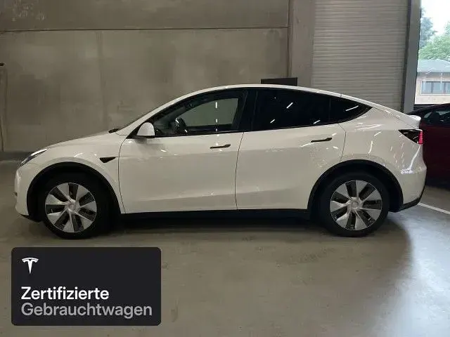 Gebraucht Tesla Model Y RWD 203 kW (277 PS) 2023 Pearl white multicoat SUV