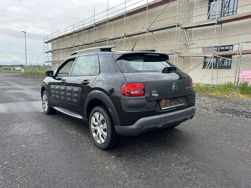 Używany Citroën C4 Feel 82 KM (60 kW) 2014 Czarny Sedan/Limuzyna