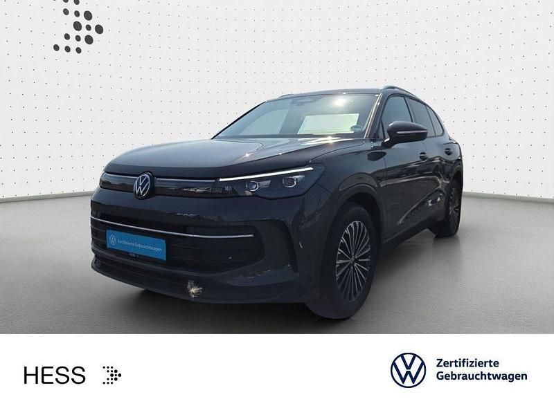Delfingrau metallic Gebraucht 2024 VW Tiguan Life SUV | 32.449 € (Fairer Preis) - Bild 1/3