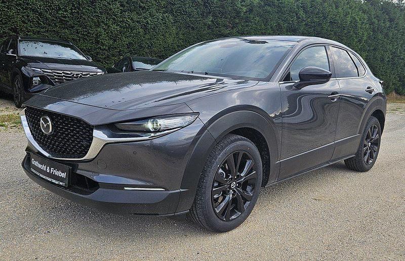 Machine gray Neu 2025 Mazda CX-30 Homura-Line SUV | 34.690 € - Bild 1/4