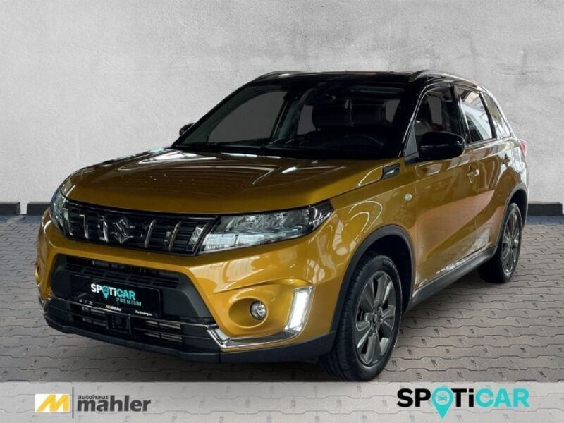 Solar yellow pearl metallic/cosmic black (metallic) Gebraucht 2022 Suzuki Vitara Comfort SUV | 19.990 € (Guter Preis) - Bild 1/4