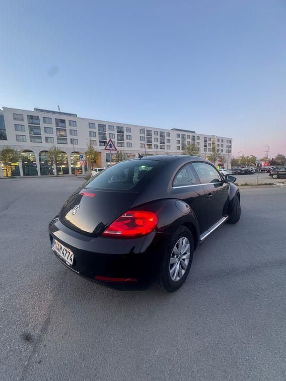 Gebraucht VW Beetle 105 PS (77 kW) 2012 Schwarz Kleinwagen