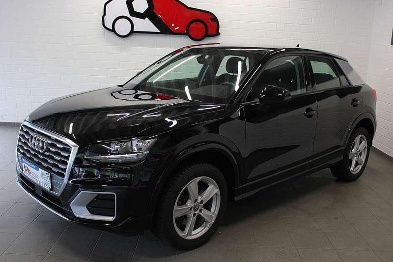 Brillantschwarz Gebraucht 2018 Audi Q2 Sport SUV | 19.990 € (Fairer Preis) - Bild 1/4