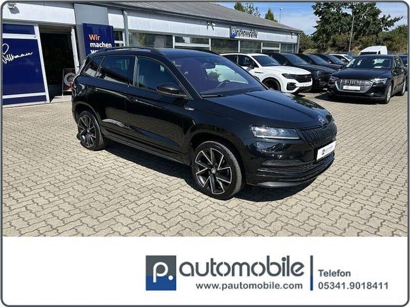 Schwarz Gebraucht 2022 Skoda Karoq SportLine SUV | 23.980 € (Teuer) - Bild 1/4