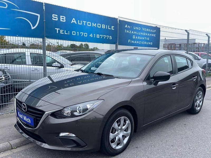 Grau Gebraucht 2014 Mazda 3 Prime-Line Limousine | 8.990 € (Etwas zu teuer) - Bild 1/4