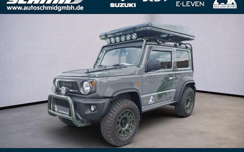 Medium gray Gebraucht 2023 Suzuki Jimny Comfort SUV | 56.490 € - Bild 1/4
