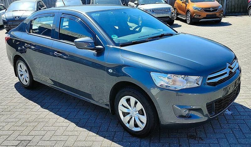 Grün Gebraucht 2016 Citroën C-Elysee I PureTech Limousine | 4.490 € - Bild 1/4