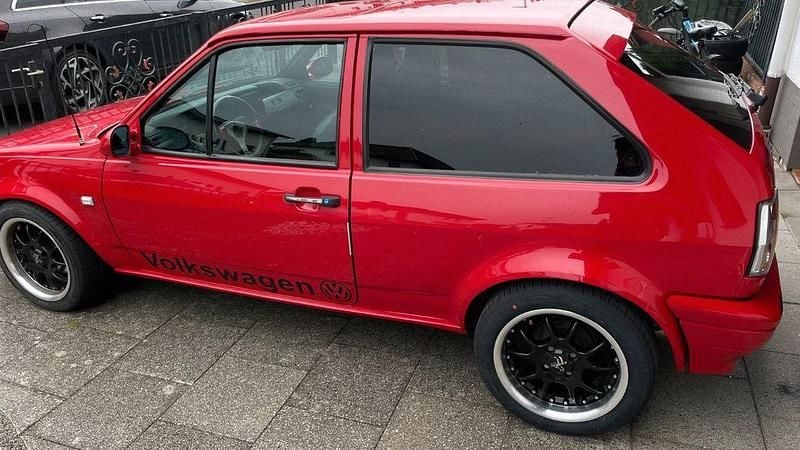 Second-hand VW Polo 75 CP (55 kW) 1992 Roșu Coupe