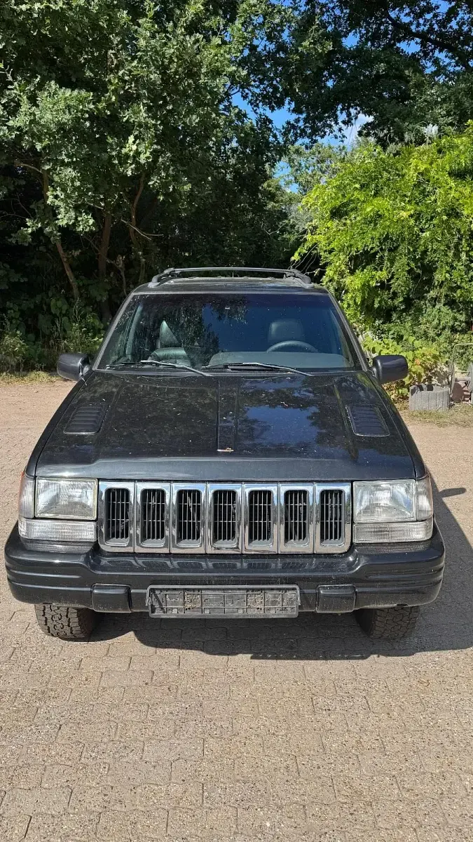Gebraucht Jeep Grand Cherokee Limited 245 PS (180 kW) 1998 Schwarz SUV