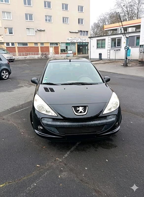 Gebraucht Peugeot 206+ 73 PS (53 kW) 2011 Schwarz Kleinwagen