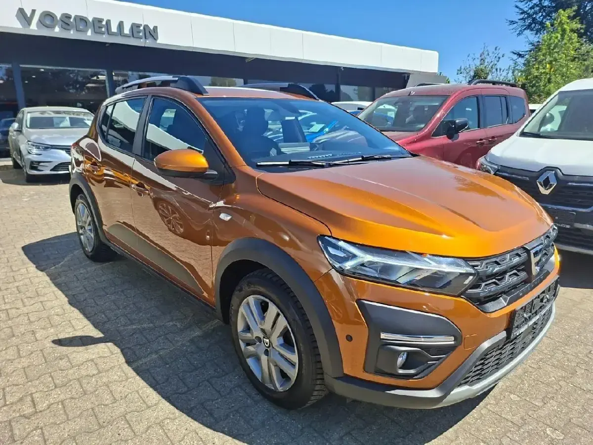 Używany Dacia Sandero Expression 91 KM (66 kW) 2021 Pomarańczowy Hatchback