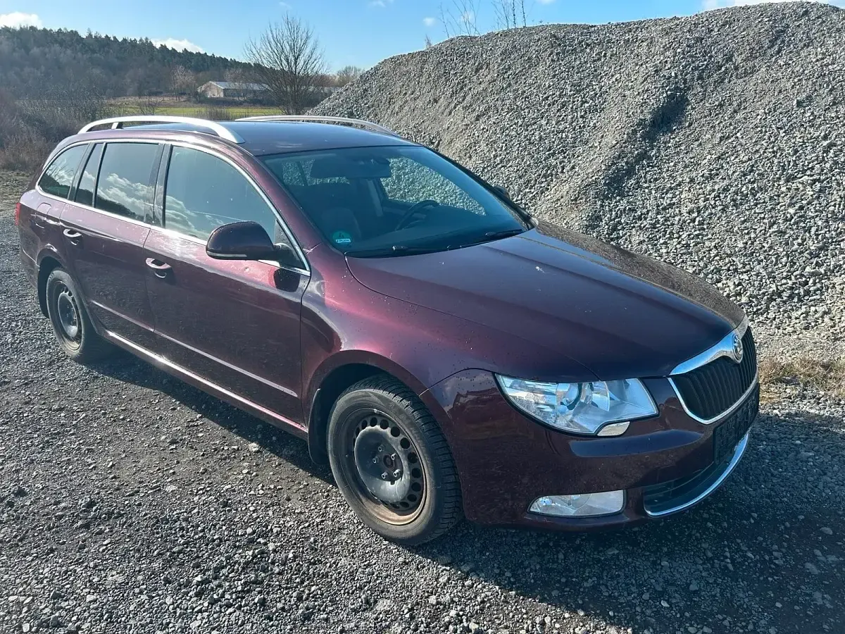 Używany Skoda Superb 160 KM (117 kW) 2010 Czerwony Kombi