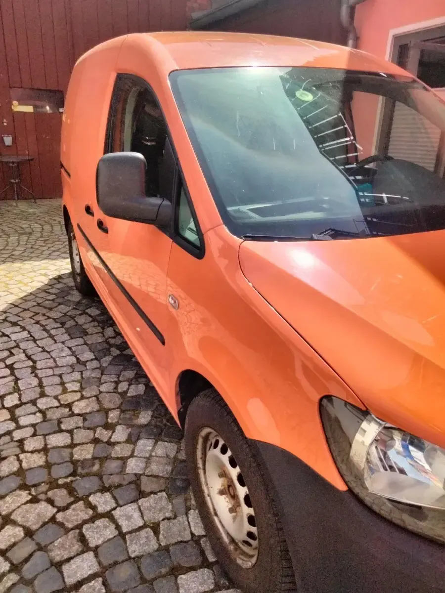 Second-hand VW Caddy 78 CP (57 kW) 2013 Portocaliu Monovolum