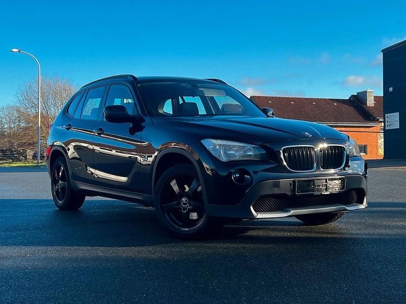Schwarz Gebraucht 2011 BMW X1 Performance SUV | 6.799 € (Superpreis) - Bild 1/4